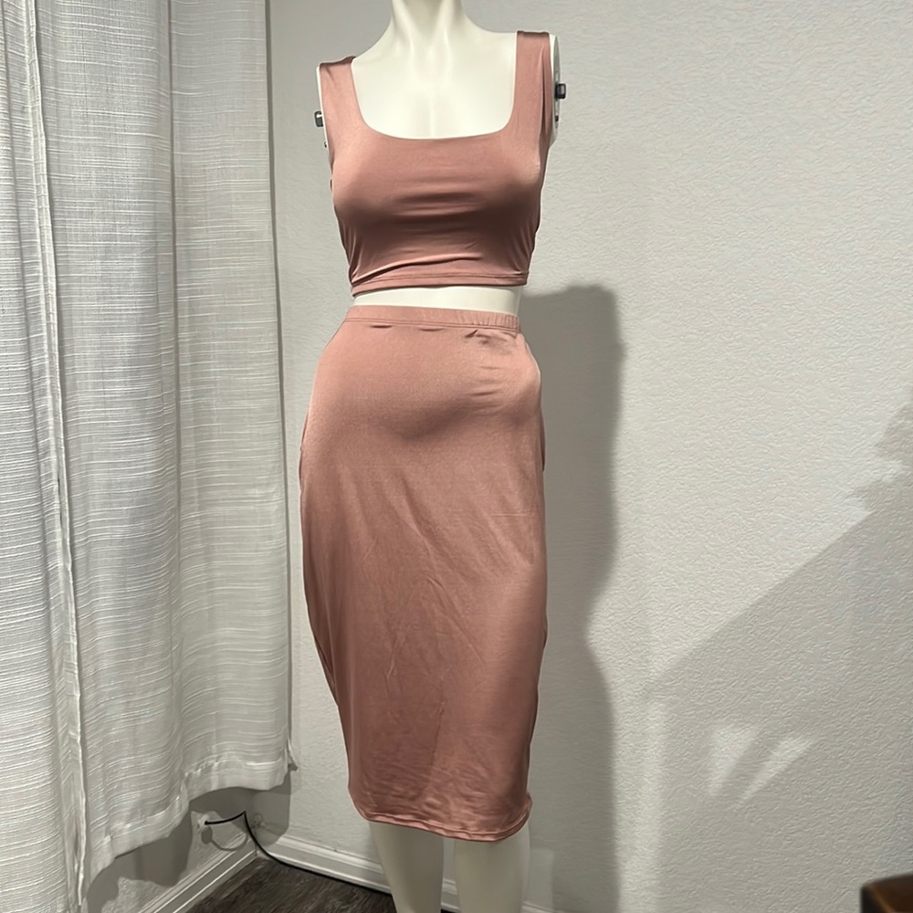 top and skirt, stretchy silk material. size L